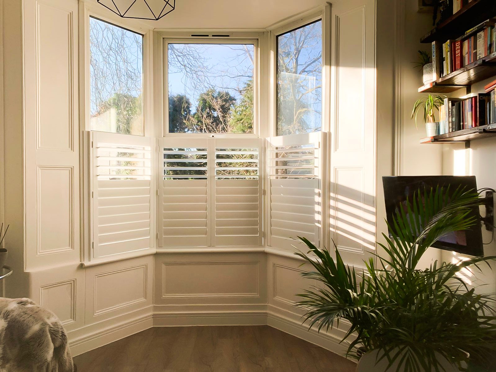 Café style shutters on a kitchen window